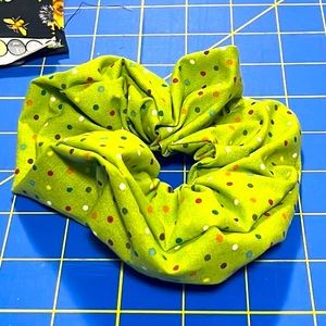 Green polka dot scrunchie